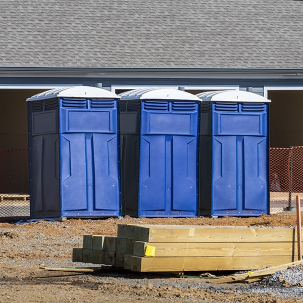 what is the cost difference between standard and deluxe portable toilet rentals in Dayton NY